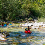 Paddling in the paradisiacal Soca Valley, simply beautiful again and again Drei Packrafter unterwegs auf der sommerlichen Soca